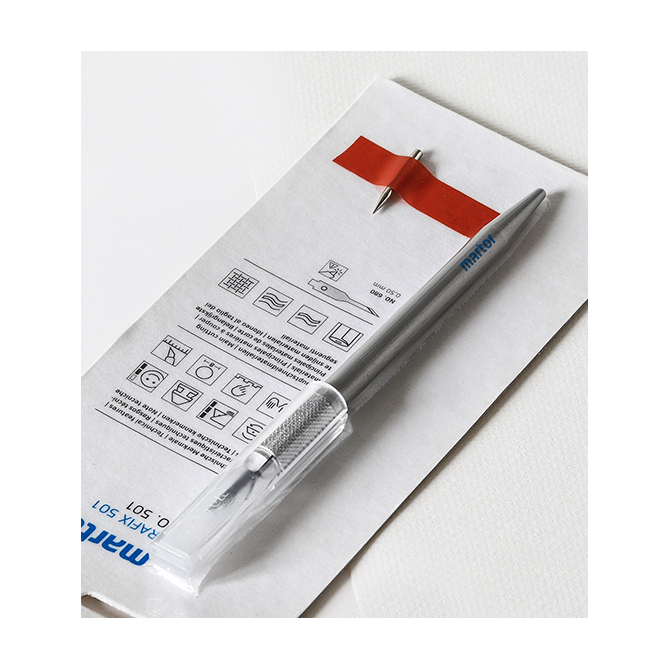 Couteau pour découper les feuilles de cire